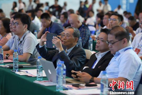 研討會現(xiàn)場圖?！■暮陚?攝